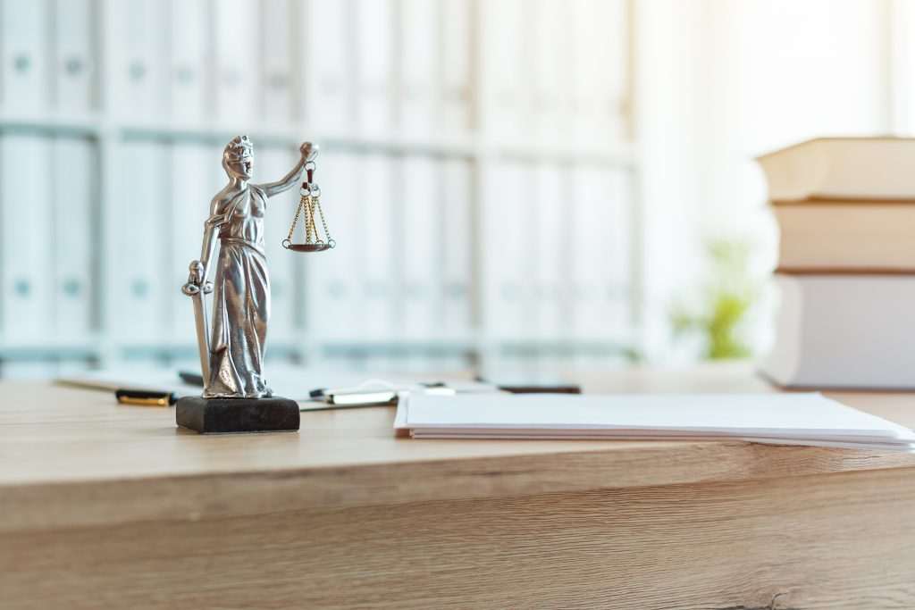 Lady Justice statue in law firm office