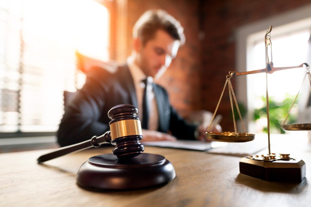 Lawyer working in office. Law and justice concept