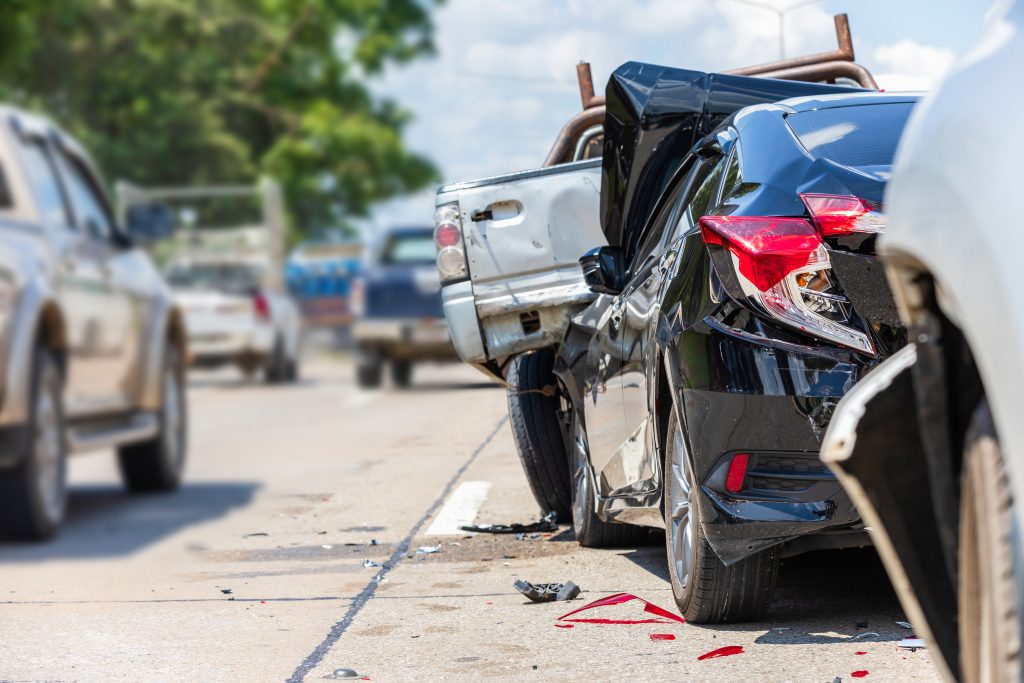 Modern car accident involving many cars on the road in Thailand