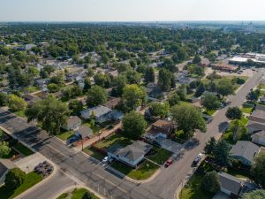 Sterling colorado summer aerial view trees are green residential area.